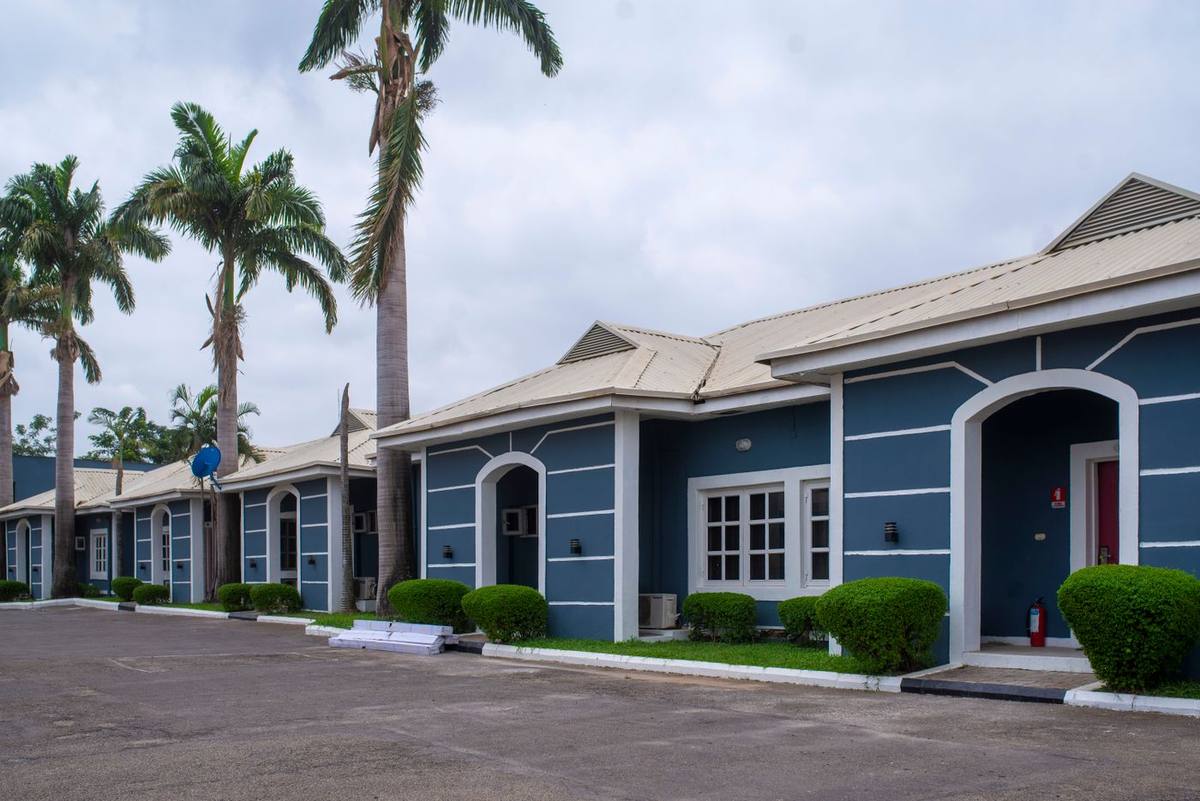 Bungalows in a gated estate with palm trees